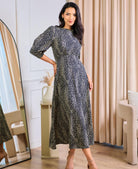 black long sleeve spots midi dress