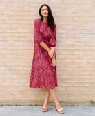 pink long sleeve pattern dress