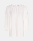 white puff sleeve top